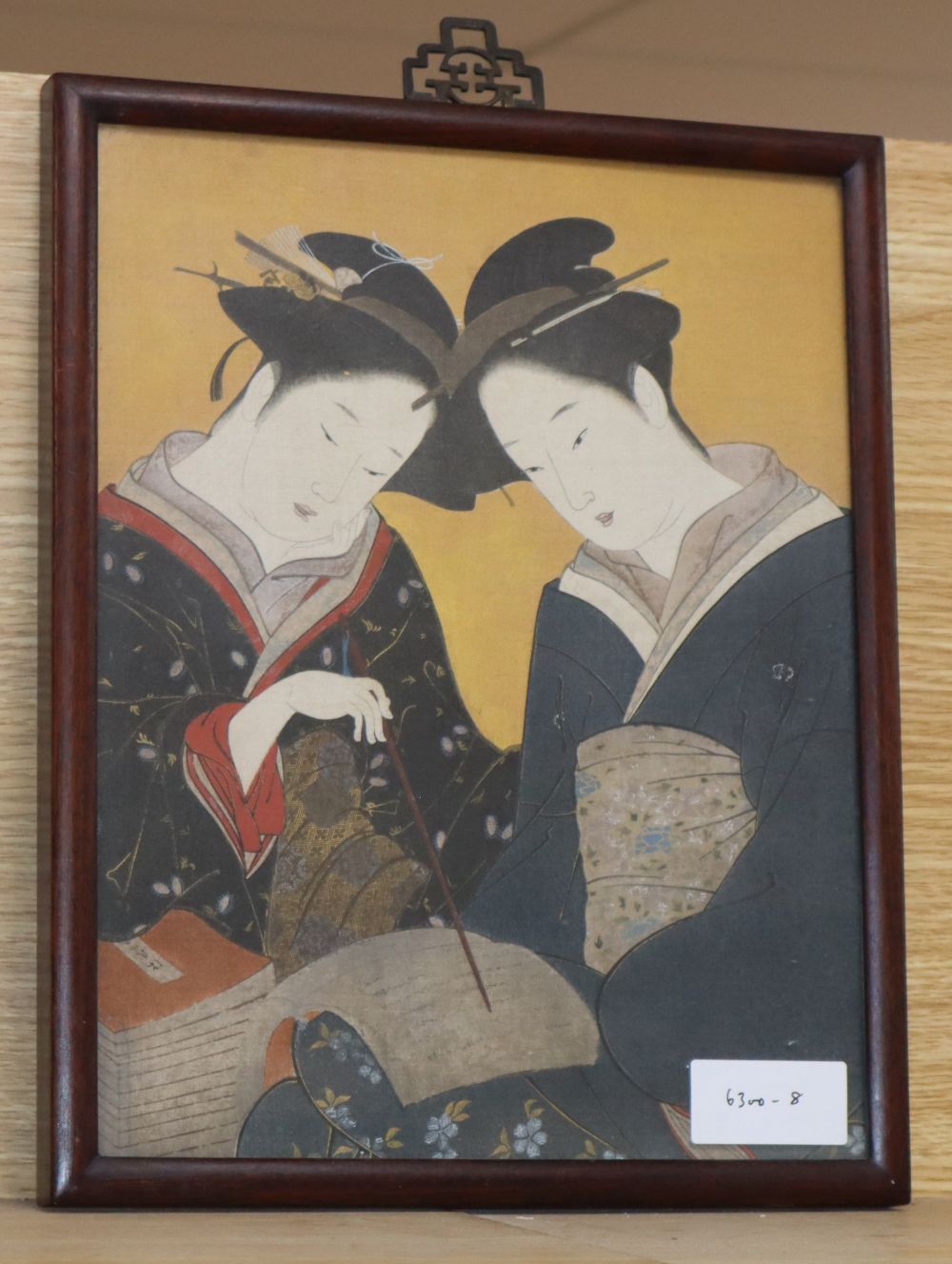 A reproduction of a woodblock print in an Asian hardwood frame, aperture 30.5 x 24cm.